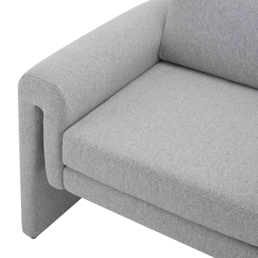 Fauteuil d'appoint minimaliste en tissu gris clair aux lignes épurées pour salon