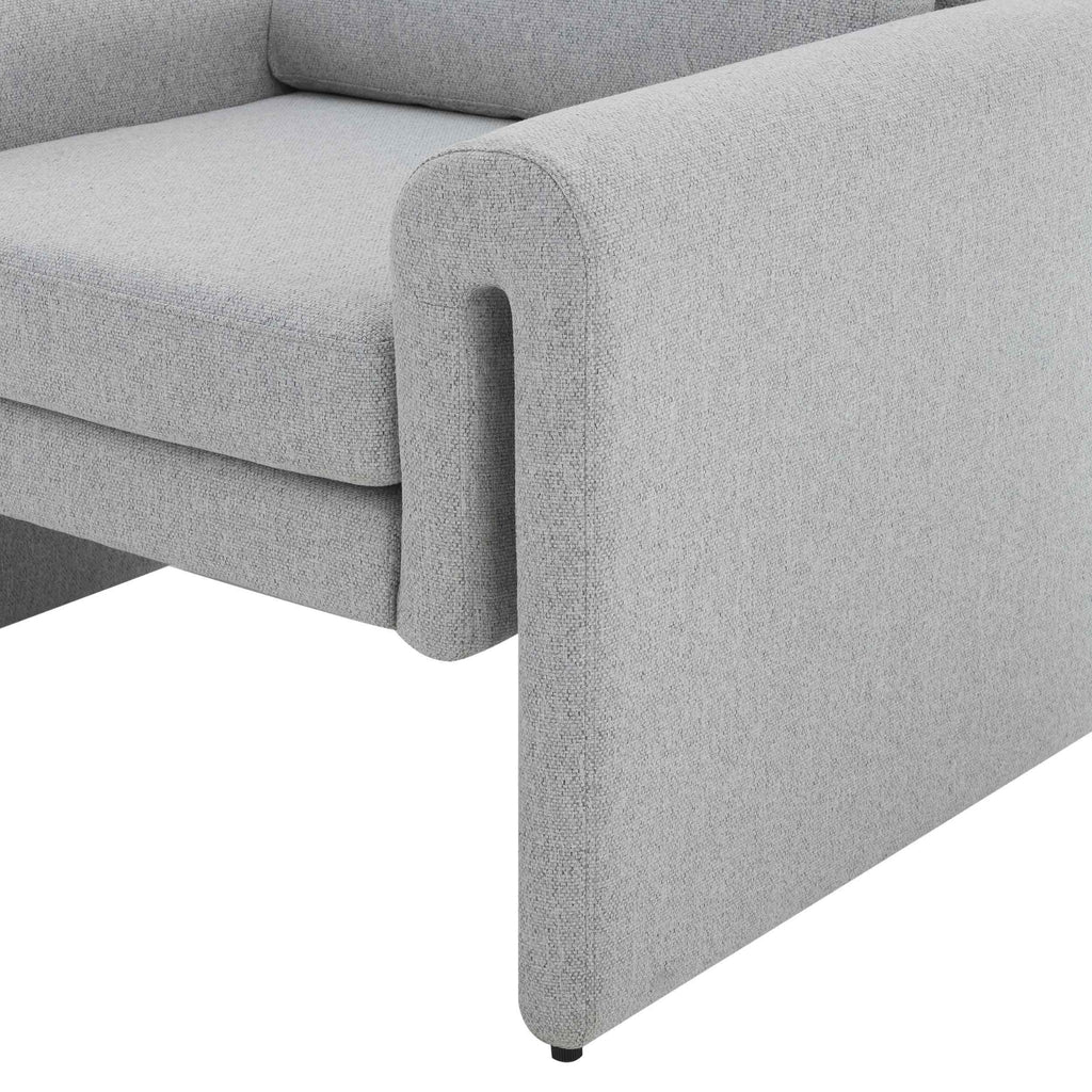 Fauteuil d'appoint minimaliste en tissu gris clair aux lignes épurées pour salon