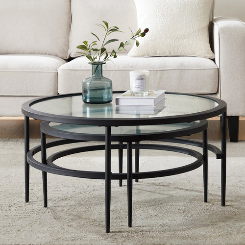 Table basse contemporaine en verre noir et métal avec design peu encombrant pour le salon