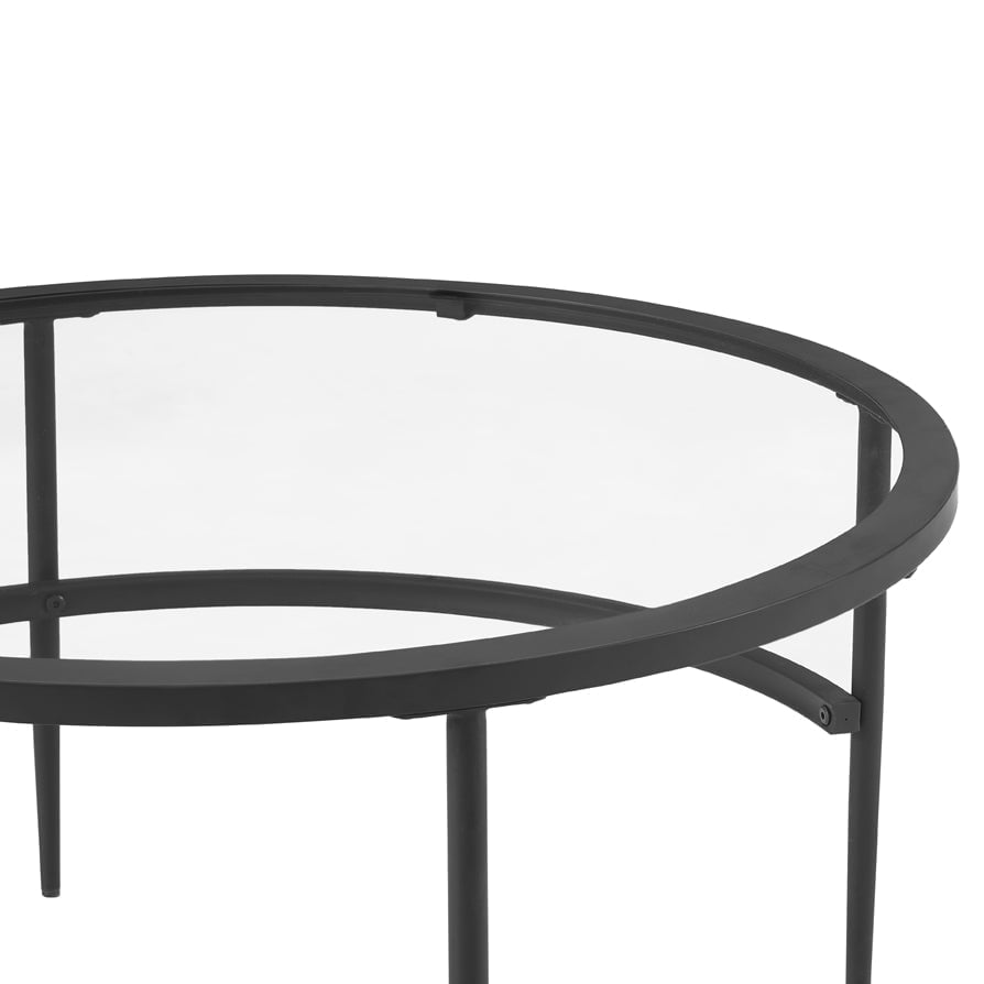 Table basse contemporaine en verre noir et métal avec design peu encombrant pour le salon
