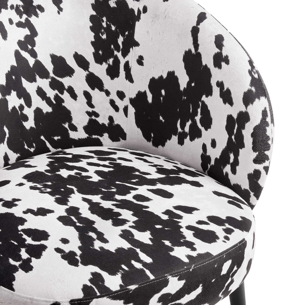 Fauteuil d'appoint éclectique en tissu imprimé vache avec design compact pour salon