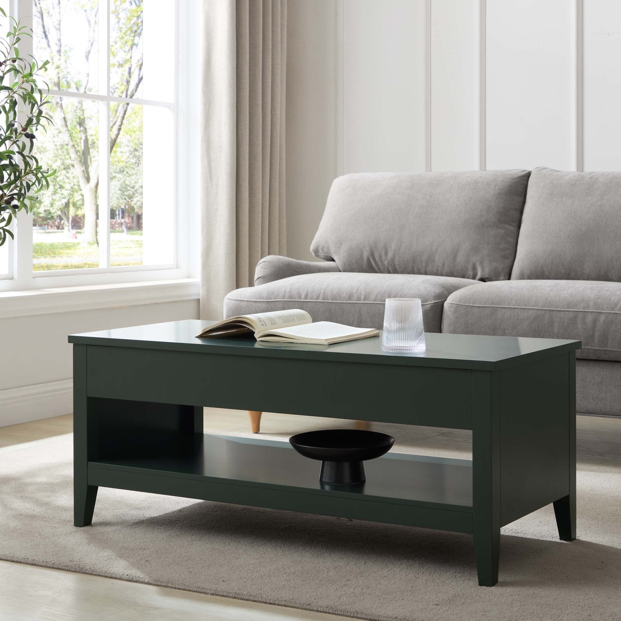 Table basse moderne vert forêt avec plateau relevable et rangement dissimulé pour le salon
