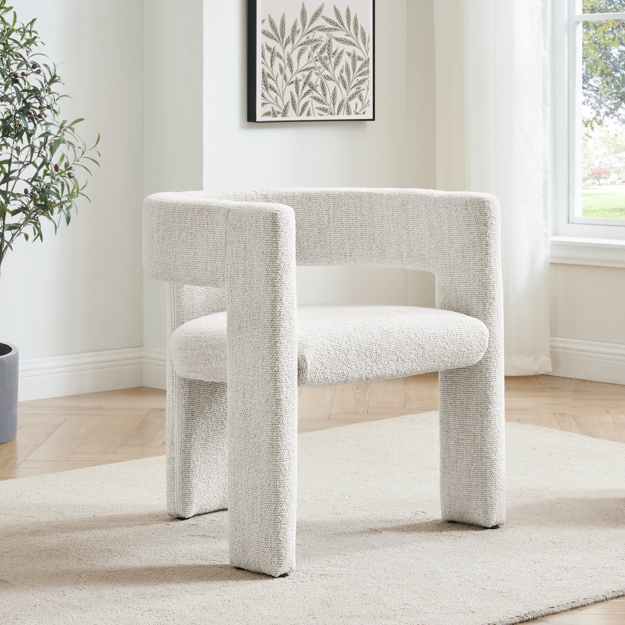 Chaise de salle à manger contemporaine en bouclé ivoire au design incurvé