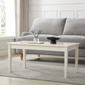 Table basse crème laquée, de style classique et aux lignes épurées pour le salon